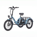 EU-F20 Mate triciclo eléctrico azul visto en ángulo frontal con neumáticos anchos, faro delantero y cesta trasera