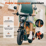 Vista frontal del patinete iScooter DX5 en movimiento, resaltando su doble suspensión premium para una conducción ultra suave. Se muestran en detalle los amortiguadores hidráulicos delanteros y la suspensión trasera de aire a presión.