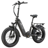 Bicicleta eléctrica plegable TTGO F6 Boost naranja en césped rural.